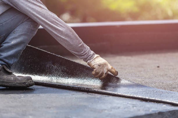 Professional Emergency Waterproofing technician working in Lisbon, ND